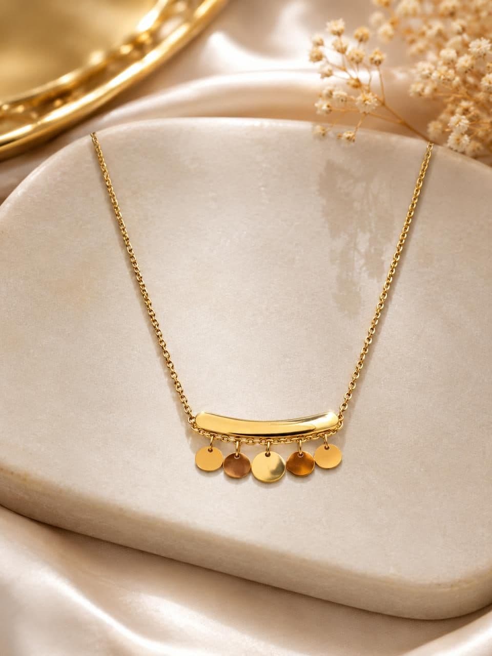 Gold bar necklace with disc drops